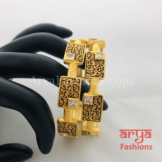 Golden Hand carved Bangles with Ruby and White Stones