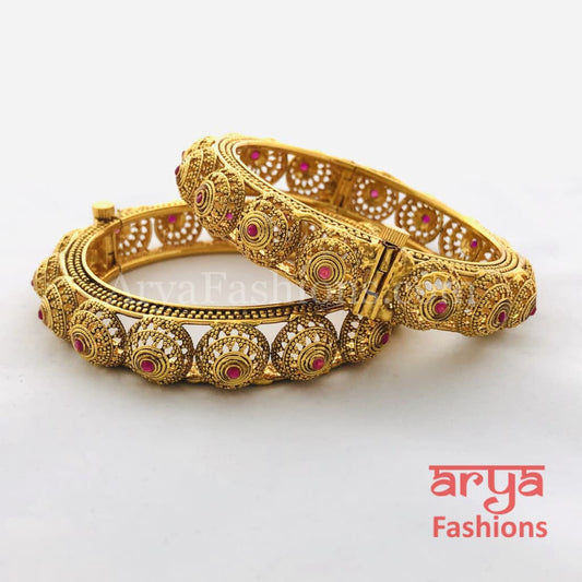 Golden Hand carved Openable Bangles with Ruby Stones