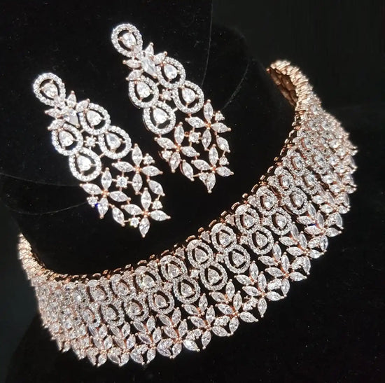 Sparkling diamond necklace and earrings set.