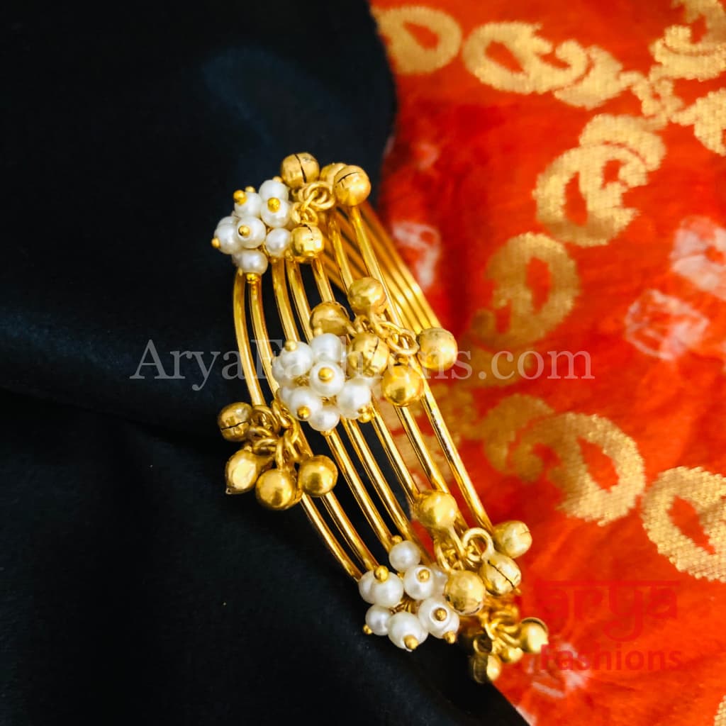 Amiera Pearl and golden beads Designer Cuff Bracelet / Golden Ethnic