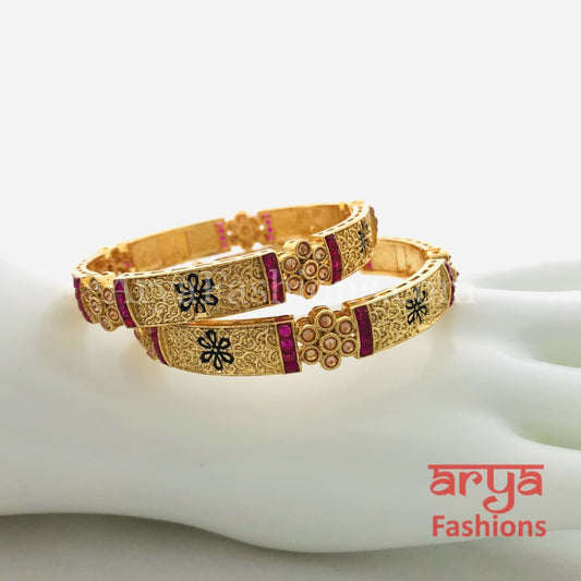 Golden Bangles with Black Meenakari Ruby and White Stones