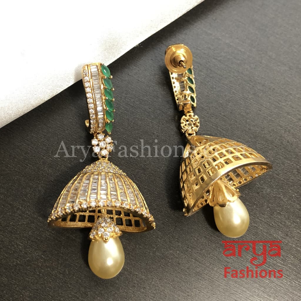 Golden Cubic Zirconia Jhumka earrings with Pearl Drop