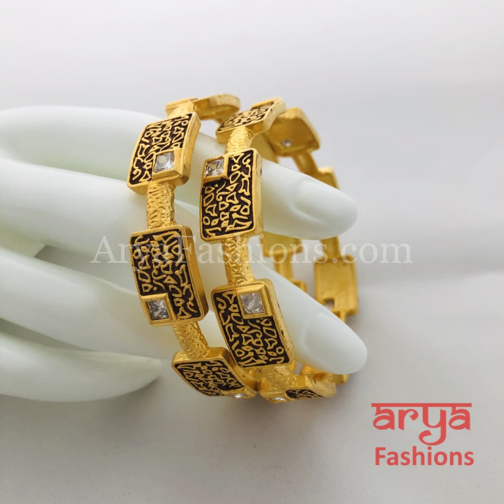 Golden Hand carved Bangles with Ruby and White Stones