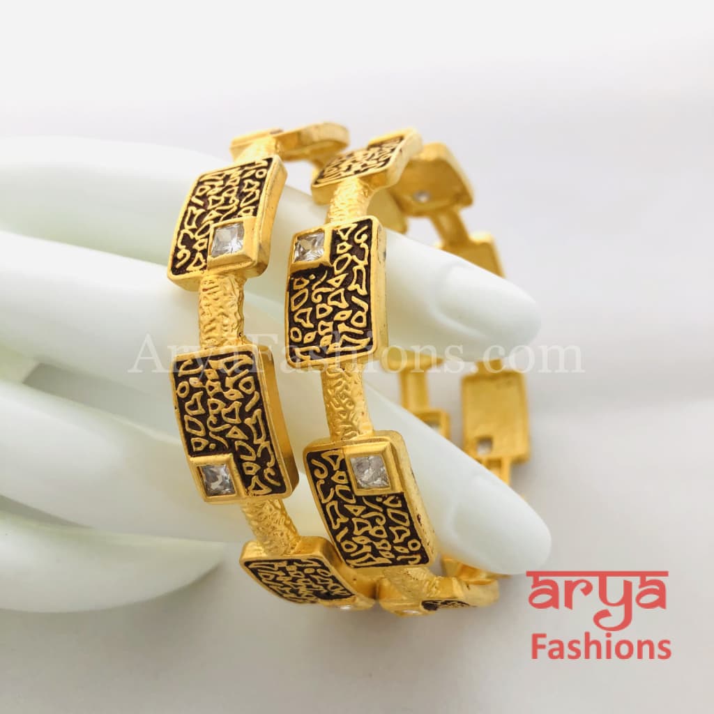 Golden Hand carved Bangles with Ruby and White Stones
