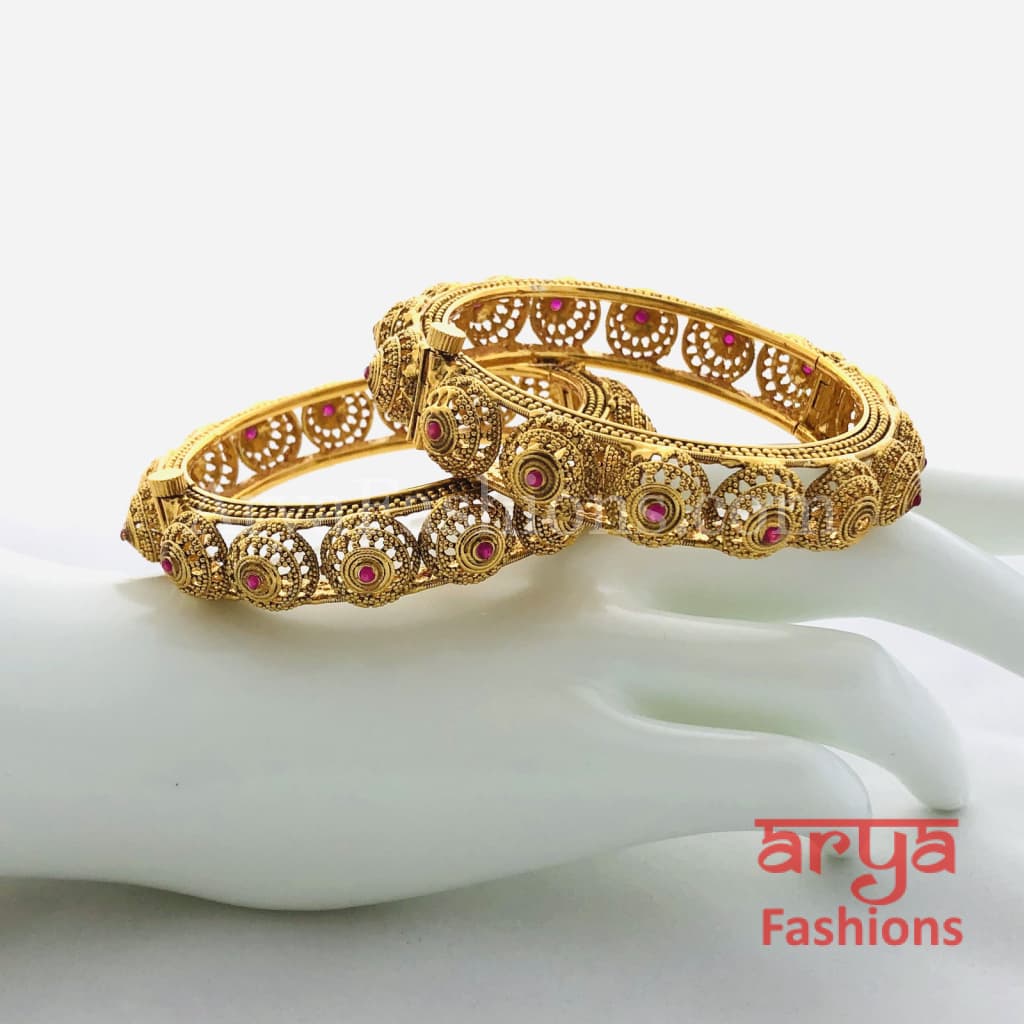 Golden Hand carved Openable Bangles with Ruby Stones