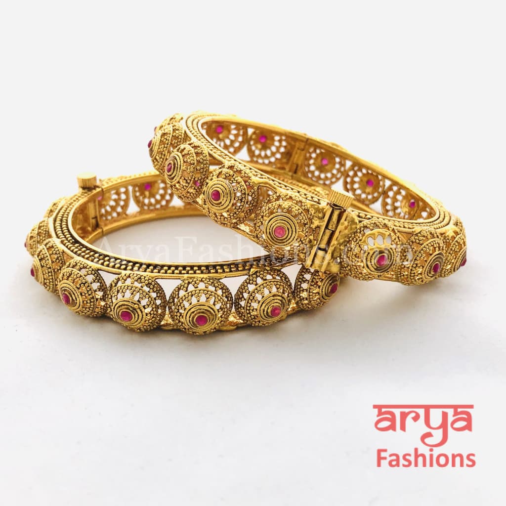 Golden Hand carved Openable Bangles with Ruby Stones