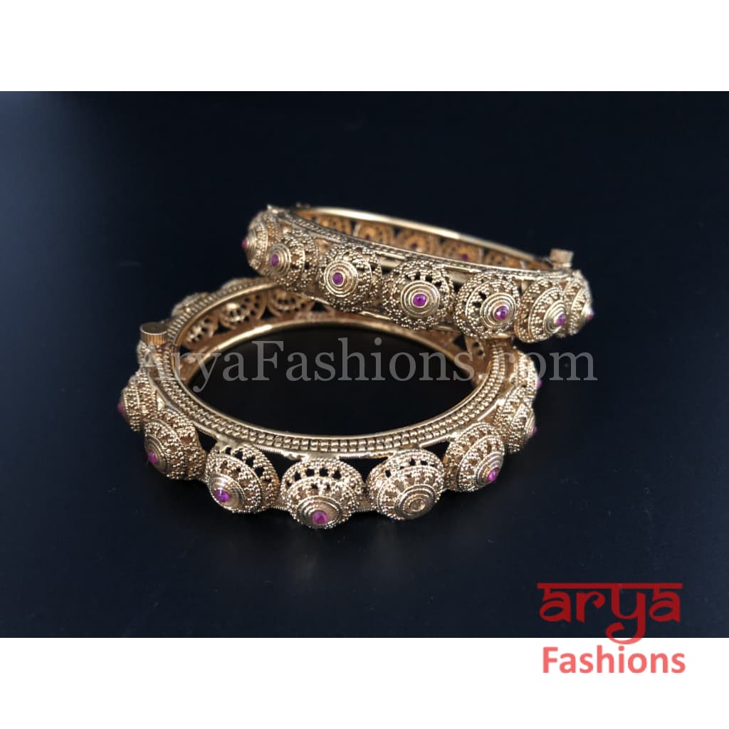 Golden Hand carved Openable Bangles with Ruby Stones