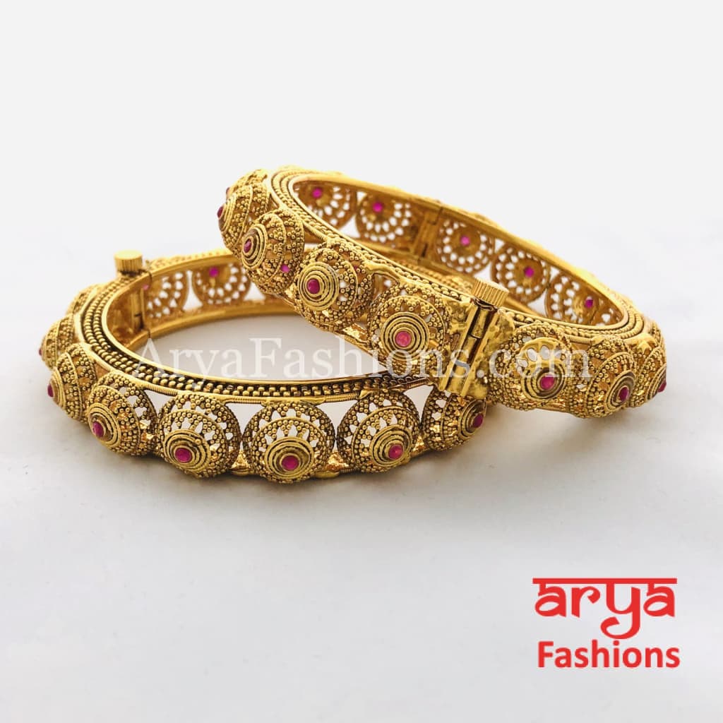 Golden Hand carved Openable Bangles with Ruby Stones